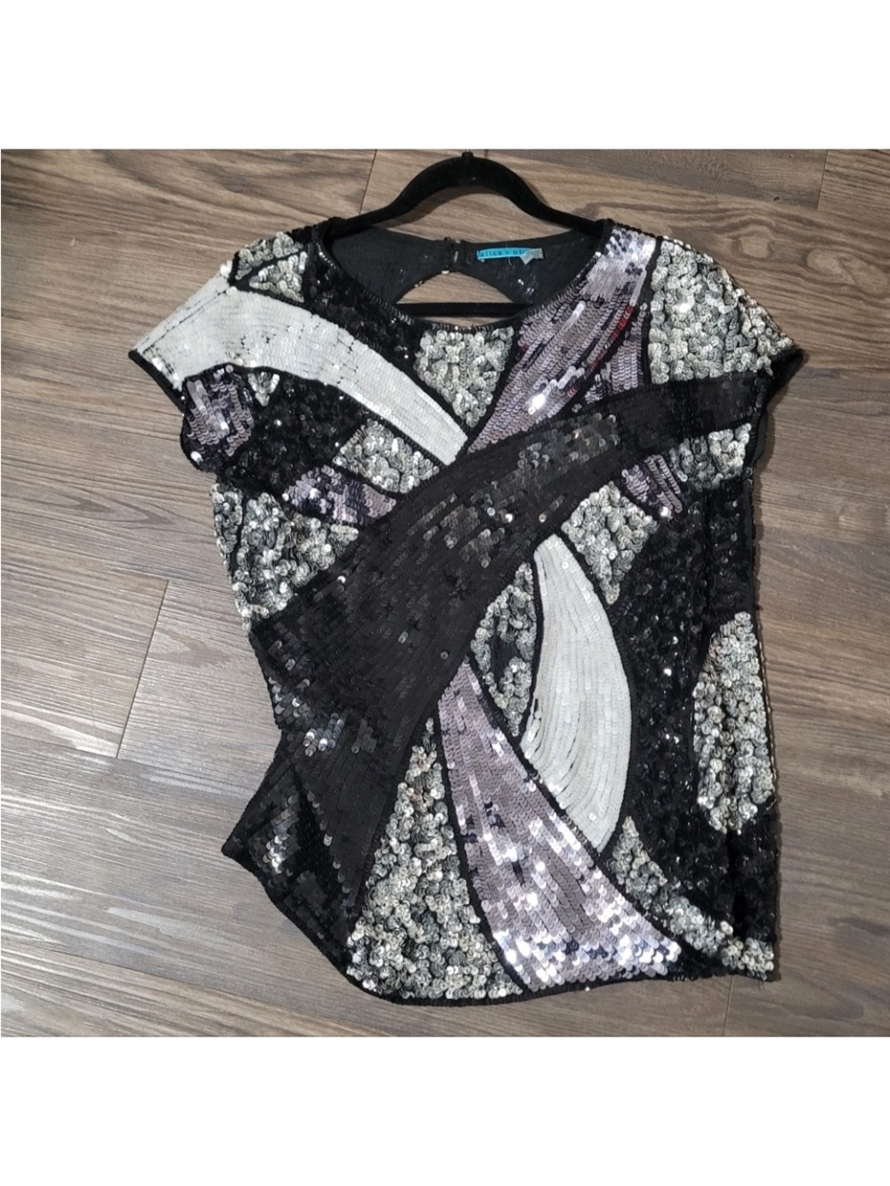 Alice and Olivia sequin top .